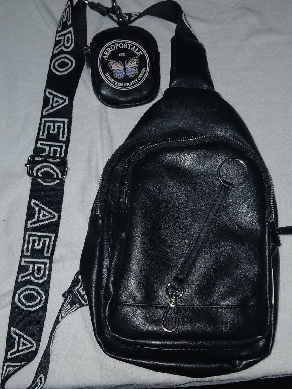 Aeropostale Black Faux-Leather Sling Bag with Branded Strap and Detachable Pouch